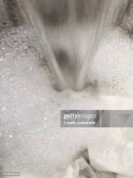 water - washing machine with bubbles stock pictures, royalty-free photos & images
