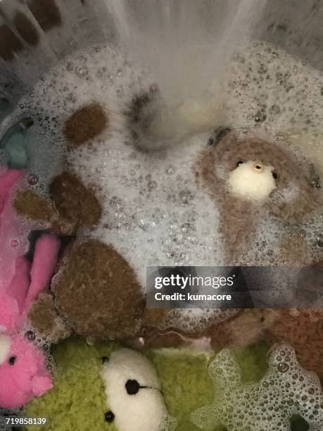 water - washing machine with bubbles stock pictures, royalty-free photos & images