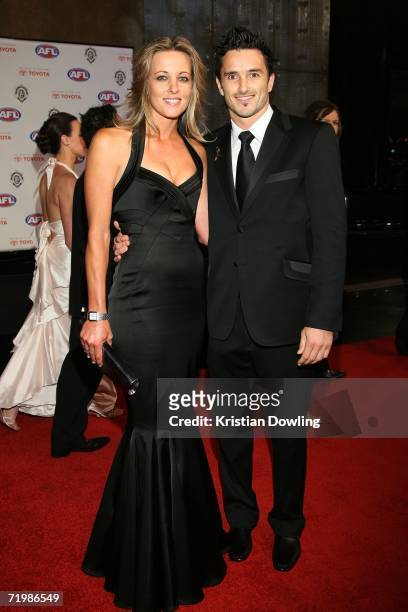 Ben Dixon of the Hawthorn Hawks and partner Kristie Newton arrive for the 2006 AFL Brownlow Medal Dinner at Crown Casino September 25, 2006 in...