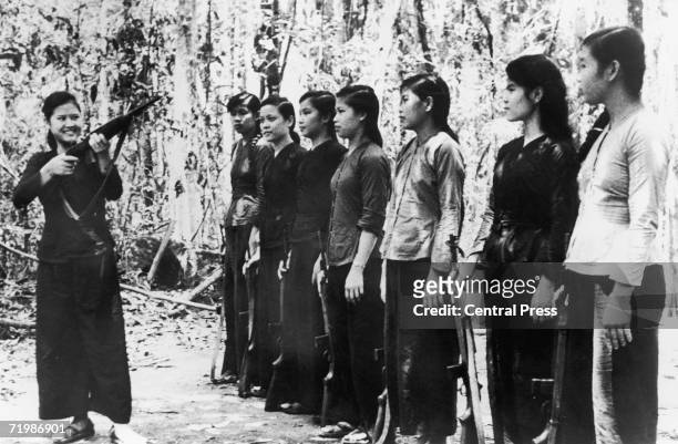 Small group of North Vietnamese women undergoing rifle training before joining Viet Cong forces during the Vietnam War, 11th September 1967. Their...