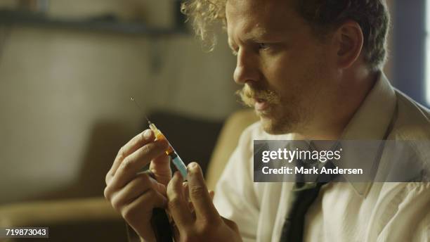 Loading Injection Needle 15 Loaded Syringe Stock Photos, High-Res Pictures, and Images - Getty ...