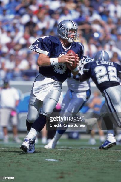 Troy Aikman of the Dallas Cowboys lines up a pass during the game against the Carolina Panthers at the Ericsson Stadium in Charlotte, North Carolina....