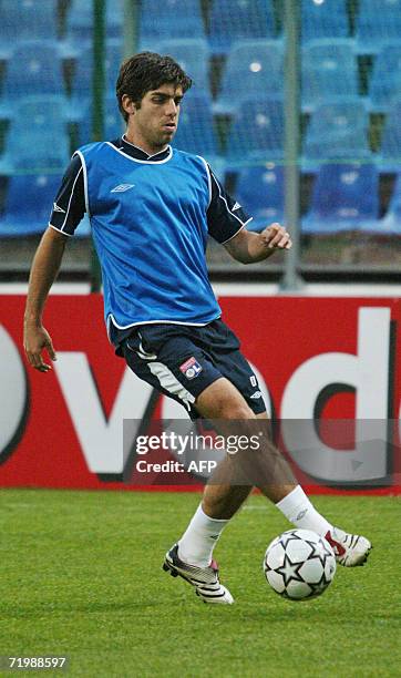Juninho Pernambucano from Lyon controls the ball during the training session on Ghencea stadium in Bucharest, 25 September 2006. Lyon will play 26...