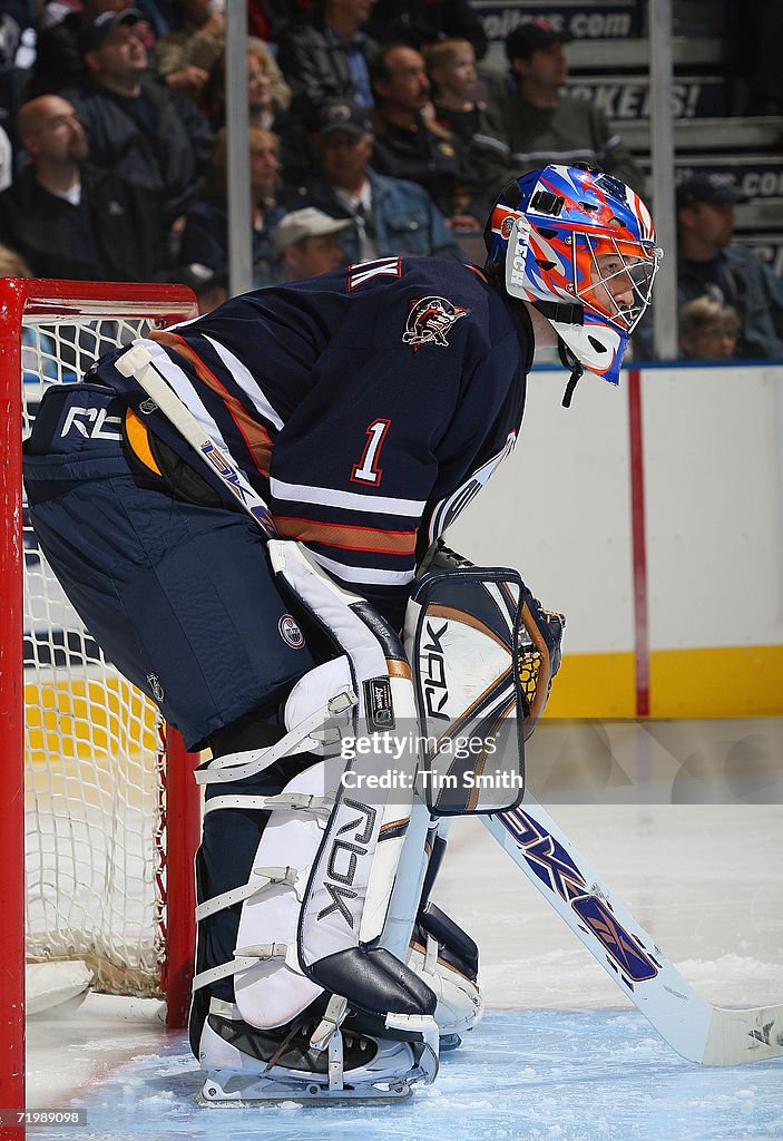 Devan Reed Calgary Goaltender Devan Dubnyk of the Edmonton Oilers looks on from his net ...