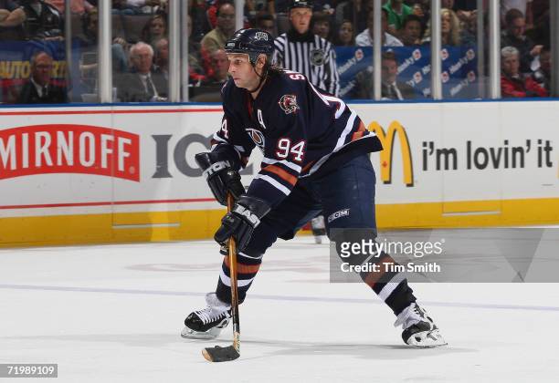 Ryan Smyth of the Edmonton Oilers looks to set up the play from the high slot during NHL preseason game action against the Calgary Flames at Rexall...