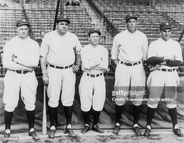 Babe Ruth, New York Yankees outfielder poses with fellow Yankees during the 1927 season. Are Waite Hoyt, Babe Ruth, manager Miller Huggins, Bob...