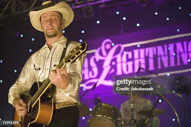 Guitarist Jon Flemming Olsen of the German country band "Texas Lightning" performs live during a concert at the Columbiahalle September 25, 2006 in...