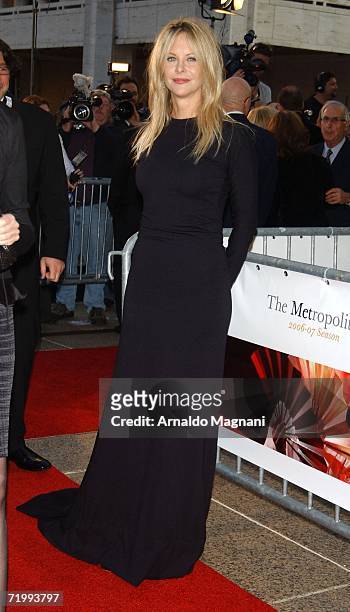 Actress Meg Ryan arrives with a guest at the Metropolitan Opera 2006-2007 season opening night at Lincoln Center September 25, 2006 in New York City....