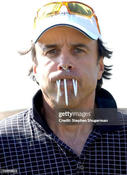 Actor Kevin Nealon poses with golf tees in his mouth at the 9th annual American Film Institute Golf Classic at he Trump National Golf Club September...