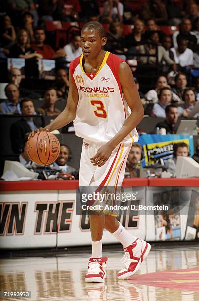 Kevin Durant of the West moves the ball against the East during the 2006 McDonald's All American High School Basketball game at Cox Arena on March...