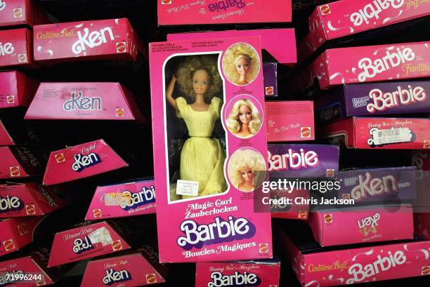 Pink boxes of barbie dolls lie at Christies South Kensington as part of a collection of 4,000 barbie dolls that will be auctioned today on September...