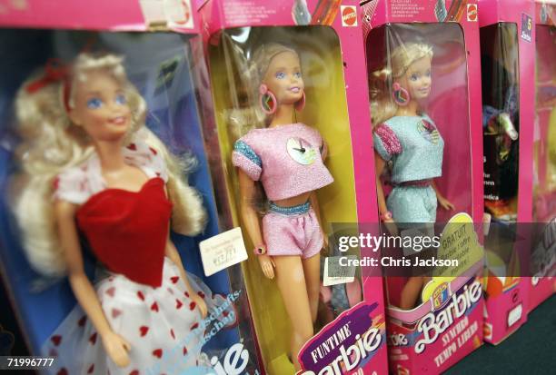 Pink boxes of barbie dolls lie at Christies South Kensington as part of a collection of 4,000 barbie dolls that will be auctioned today on September...