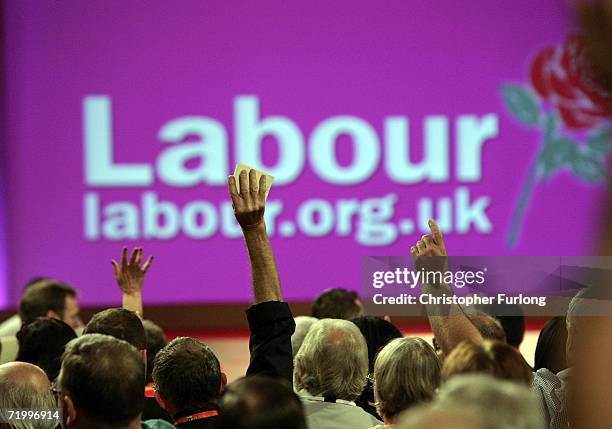 Labour party members vote with a show of hands at their autumn conference in the GMEX centre on September 26, 2006 in Manchester, England. Today Mr...