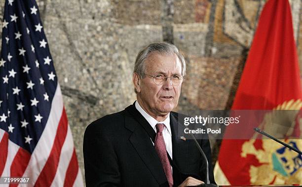 Secretary of Defense Donald H. Rumsfeld pauses during a joint news conference with Montenegrin Prime Minister Milo Djukanovic, not pictured on...