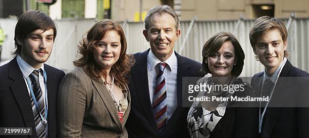 Prime Minister Tony Blair , Cherie Blair daughter Kathryn and sons Euan and Nicky pose for photographers after he gave his keynote speech at the...