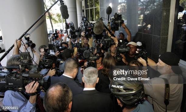 Former Enron CFO Andrew Fastow is surrounded by media as he arrives at the Bob Casey U.S. Courthouse for sentencing from his conviction related to...
