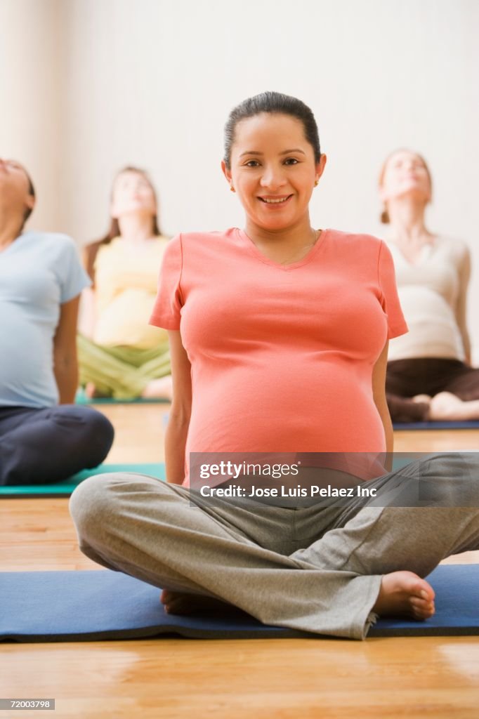 Pregnant women in yoga class