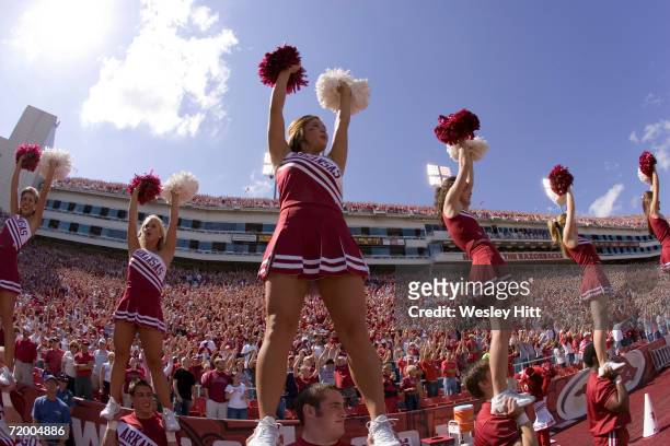 Arkansas Razorback cheerleaders perform during a game against the Alabama Crimson Tide at Donald W. Reynolds Stadium on September 23, 2006 in...