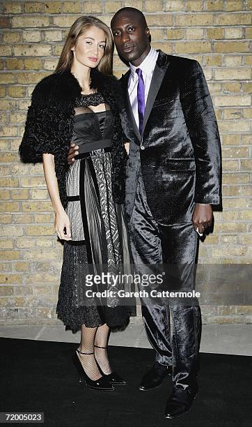 Ozwald Boateng and wife Guynel arrive at the Fortune Forum Summit held at Old Billingsgate Market on September 26, 2006 in London, England.