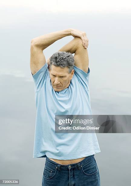 3,195 Tricep Stretch Stock Photos, High-Res Pictures, and Images - Getty  Images