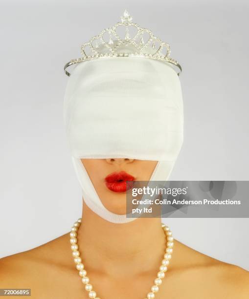 Woman Wearing Tiara And Plastic Surgery Bandages, 照片檔