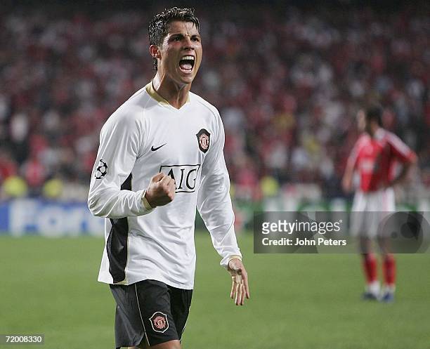 Cristiano Ronaldo of Manchester United celebrates Louis Saha scoring the first goal during the UEFA Champions League match between Benfica and...