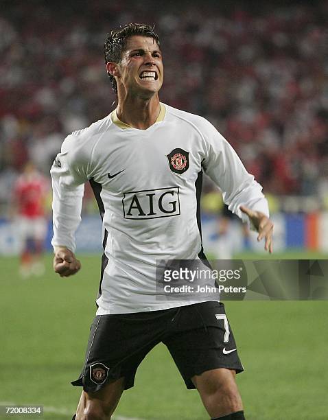 Cristiano Ronaldo of Manchester United celebrates Louis Saha scoring the first goal during the UEFA Champions League match between Benfica and...