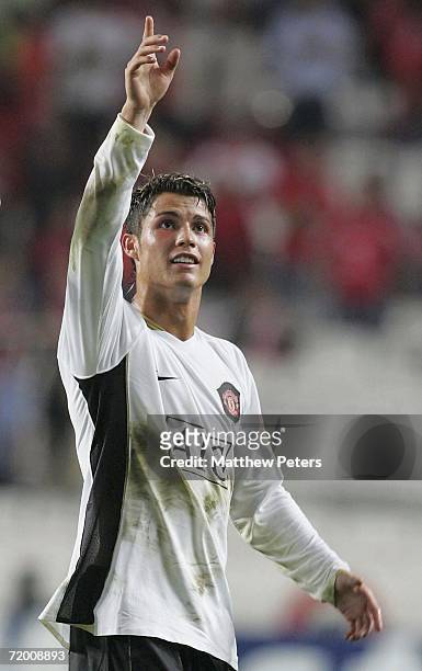 Cristiano Ronaldo of Manchester United salutes the away fans after the UEFA Champions League match between Benfica and Manchester United at the...