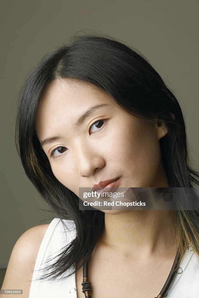 Portrait of a young woman thinking