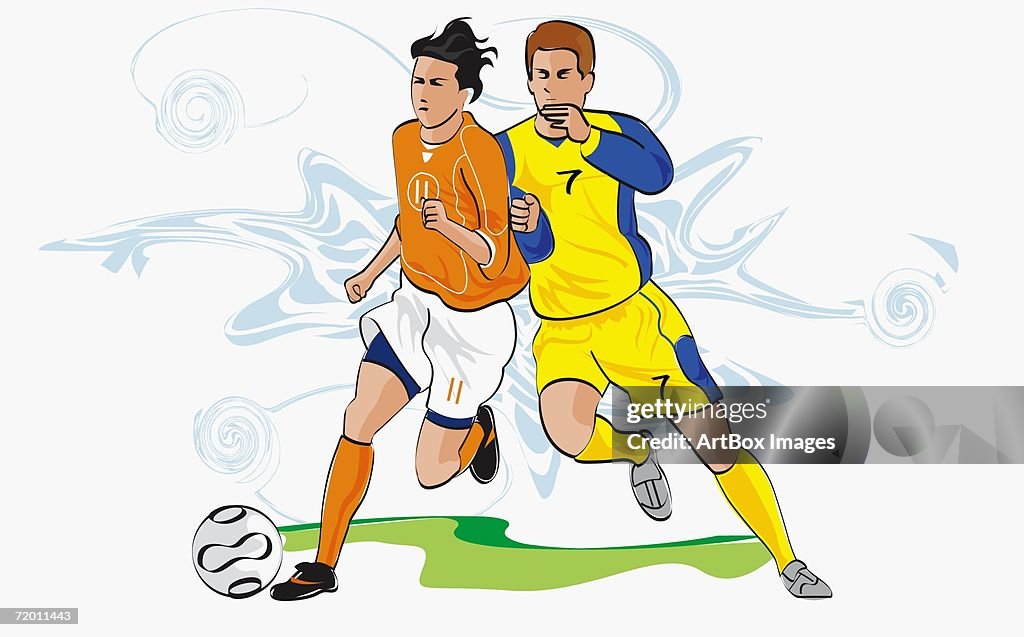 Two soccer players running after a soccer ball