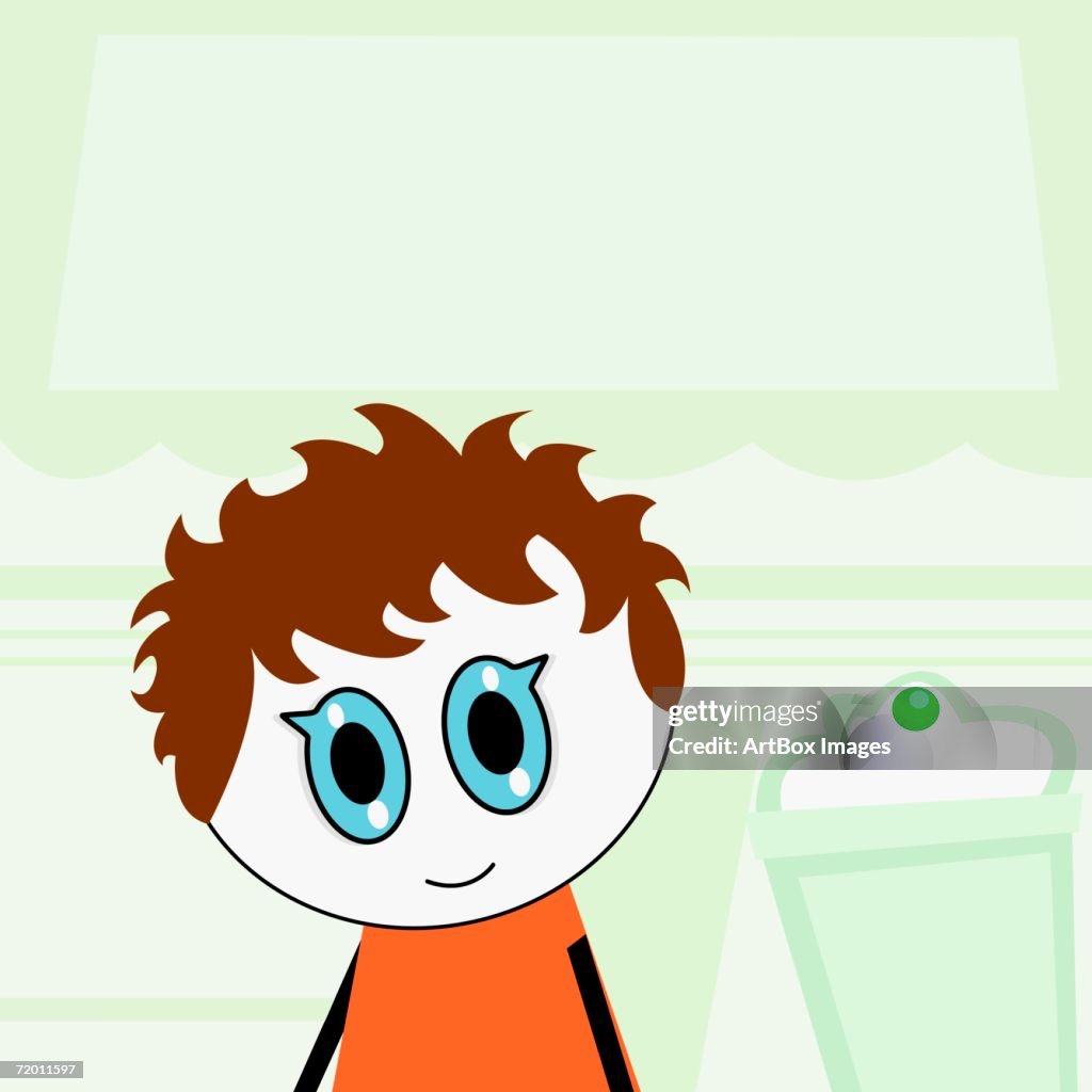 Portrait of a boy sitting near an ice-cream float