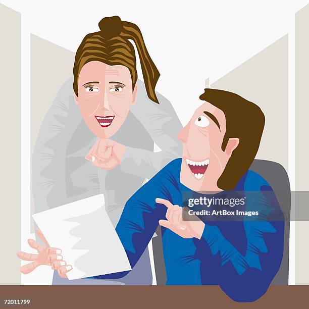 close-up of a businessman and a businesswoman discussing in an office - box office stock illustrations stock illustrations