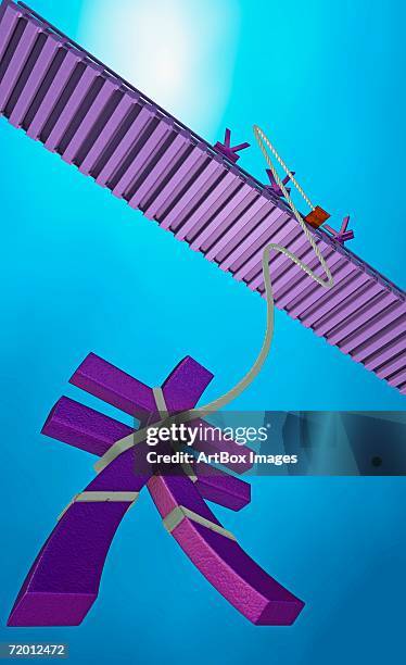 stockillustraties, clipart, cartoons en iconen met low angle view of a yen sign hanging with a bungee cord from a bridge - bungee cord