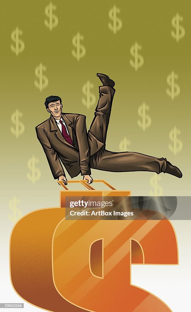 Businessman performing gymnastics on a dollar sign
