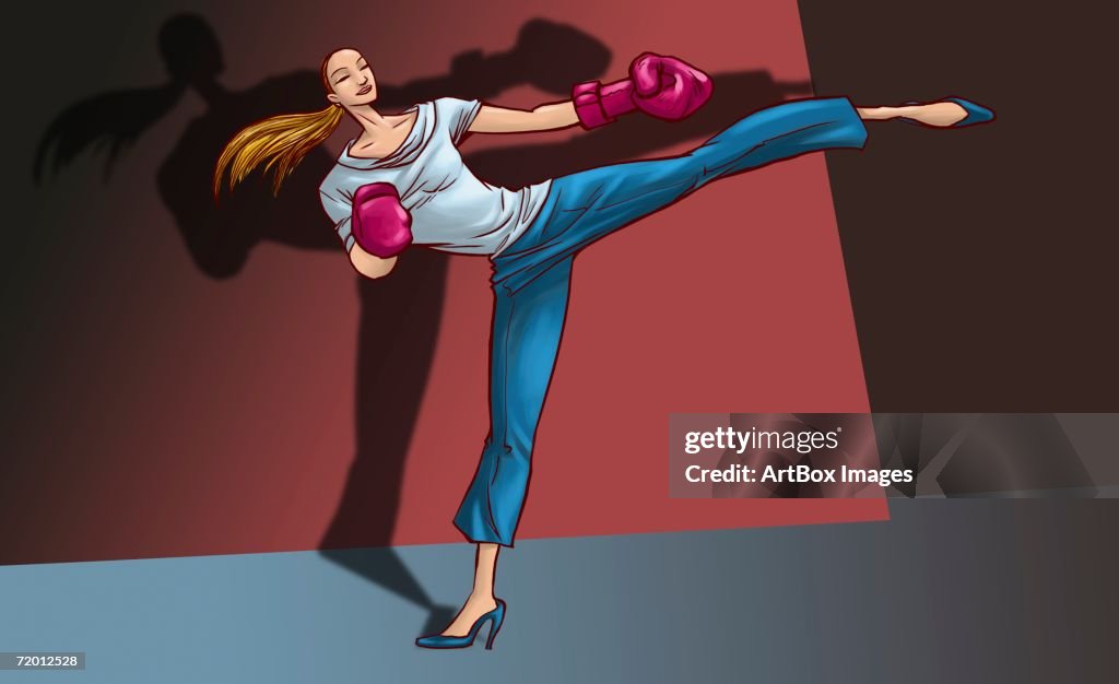 Young woman practicing kickboxing