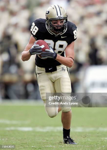 Jake Standeford of the Purdue Boilermakers runs with the ball against the Minnesota Golden Gophers during a Big Ten Conference game September 23,...