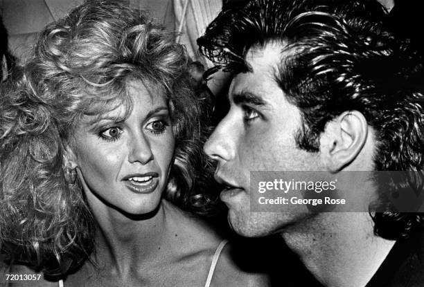 Singer and actress Olivia Newton-John and co-star John Travolta attend their 1978 Hollywood, California, premiere of "Grease." Produced by Alan Carr,...