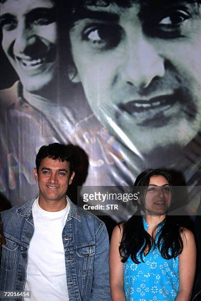 In this picture taken 26 January 2006, Indian actor Aamir Khan and co-star Soha Ali Khan pose for a promotional event of the film "Rang De Basanti"...