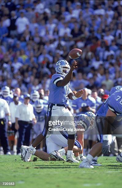 Ronald Curry of the University of North Carolina Tar Heels passes the ball during the game against the Georgia Tech Yellow Jackets at the Kenan...