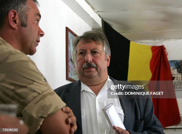 Belgian Defence Minister Andre Flahaut speaks with a Belgian UNIFIL soldier during his visit at the UNIFIL camp in Tibnin in South Lebanon, 24...