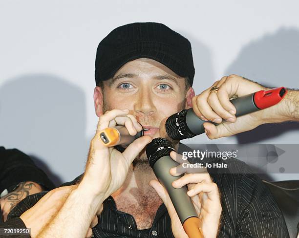 Jason Brown of British boyband 5ive attends a photocall as the announce their reforming, at the Carling Academy, Islington on September 27, 2006 in...