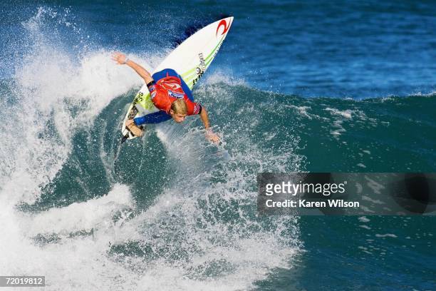 The current ASP world number eight Mick Fanning of Australia surfs during round two of the Quiksilver Pro France event of the Fosters Men's Asp World...