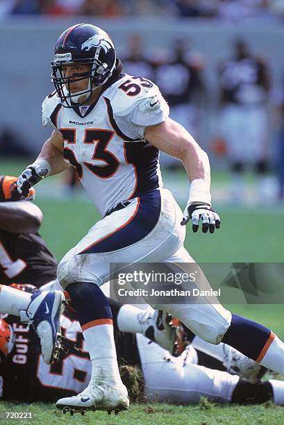 Bill Romanowski of the Denver Broncos starts to run during the game against the Cincinnati Bengals at the Paul Brown Stadium in Cincinnati, Ohio. The...