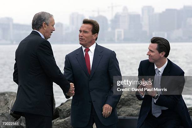 New York Governor George Pataki shakes hands with California Governor Arnold Schwarzenegger and San Francisco Mayor Gavin Newsom on September 27,...