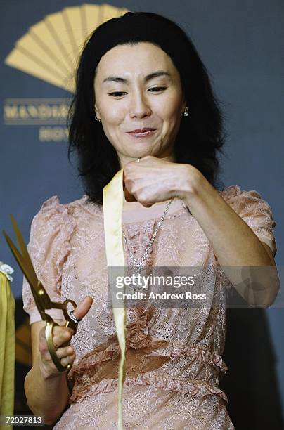 Actress Maggie Cheung attends the official ribbon cutting ceremony marking the re-opening of Hong Kong's Mandarin Oriental hotel on September 28,...