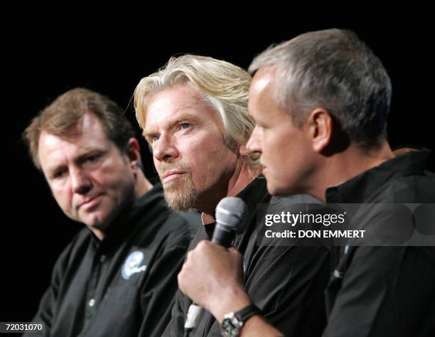 New York, UNITED STATES: Will Whitehorn , President Virgin Atlantic, Sir Richard Branson , founder Virgin Group, and Stephen Attenborough, head of...