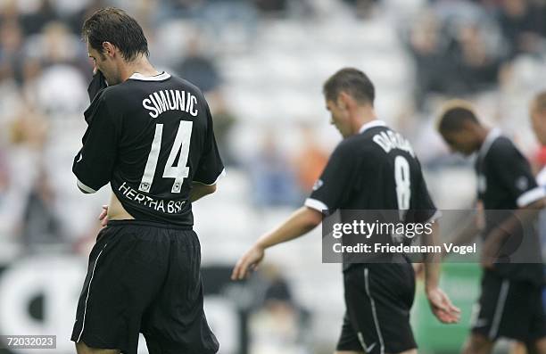 Josip Simunic, Pal Dardai and Kevin-Prince Boateng of Hertha looks dejected during the UEFA Cup second leg match between Odense BK and Hertha BSC...