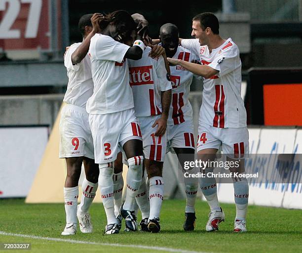 Marcelo Carlos Curbelo of Nancy celebrates the second goal with teammates during the UEFA Cup second leg match between AS Nancy and Schalke 04 at the...