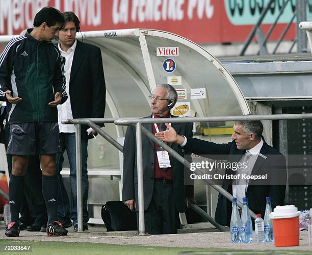 The fourth referee sends head coach Mirko Slomka off the sideline into the dog out during the UEFA Cup second leg match between AS Nancy and Schalke...