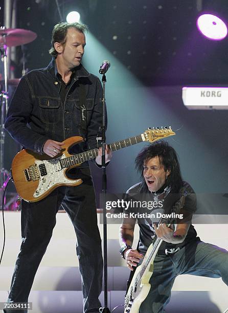 Mark Gable and Ian Hulme of the Choirboys perform at Channel Nine's AFL Grand Final Footy Show at Rod Laver Arena on September 28, 2006 in Melbourne,...